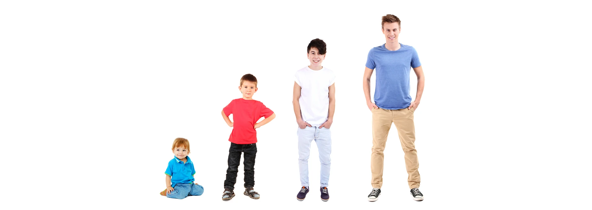 Growing up with eczema: four boys from 1-teen standing in height order, all trying to look cool!